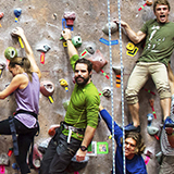 active aztecs - students on rock climbing wall