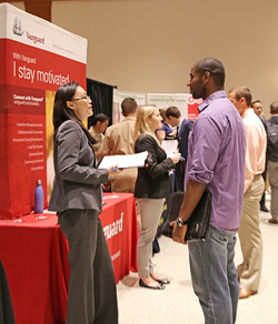 student and an employer at a career fair