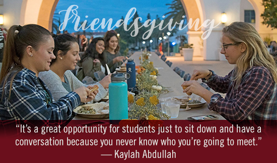 students gathering at friendsgiving dinner