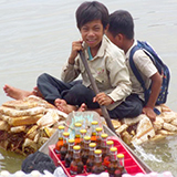 international kids on homemade raft