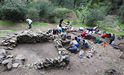 students digging at the Nate Harrison dig