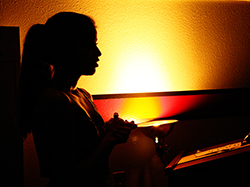 silhouette of girl studying