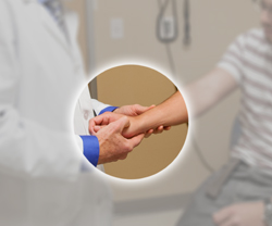 a doctor examines a patient's skin