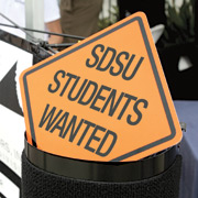 construction sign that reads: SDSU Students Wanted