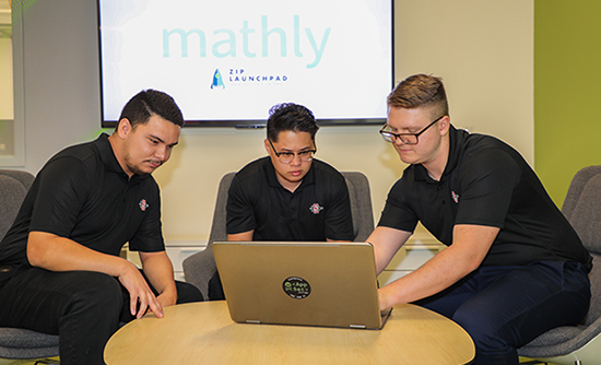 CS majors R. Carpenter, R Dirawatun and J Goold working on their app at the ZIP Launchpad.